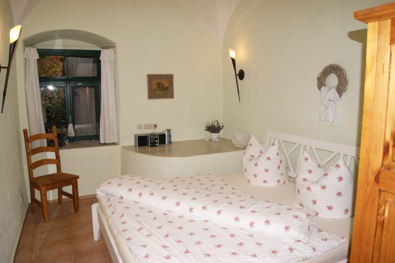Ferienwohnung Kirchplatz – Schlafzimmer mit Doppelbett Ferienwohnung Kirchplatz - Schlafzimmer mit Doppelbett